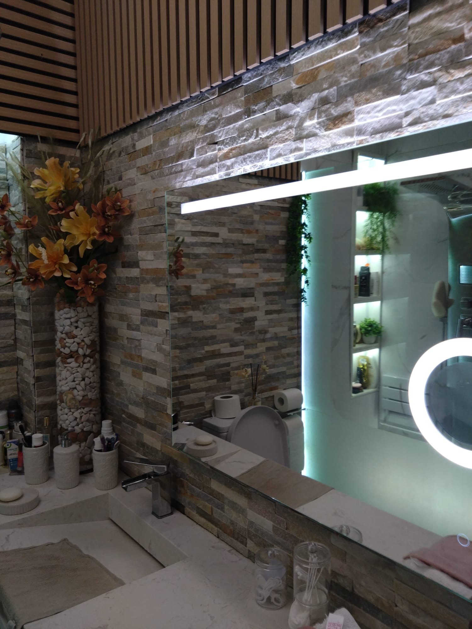 Illuminated bathroom mirror and feature lighting