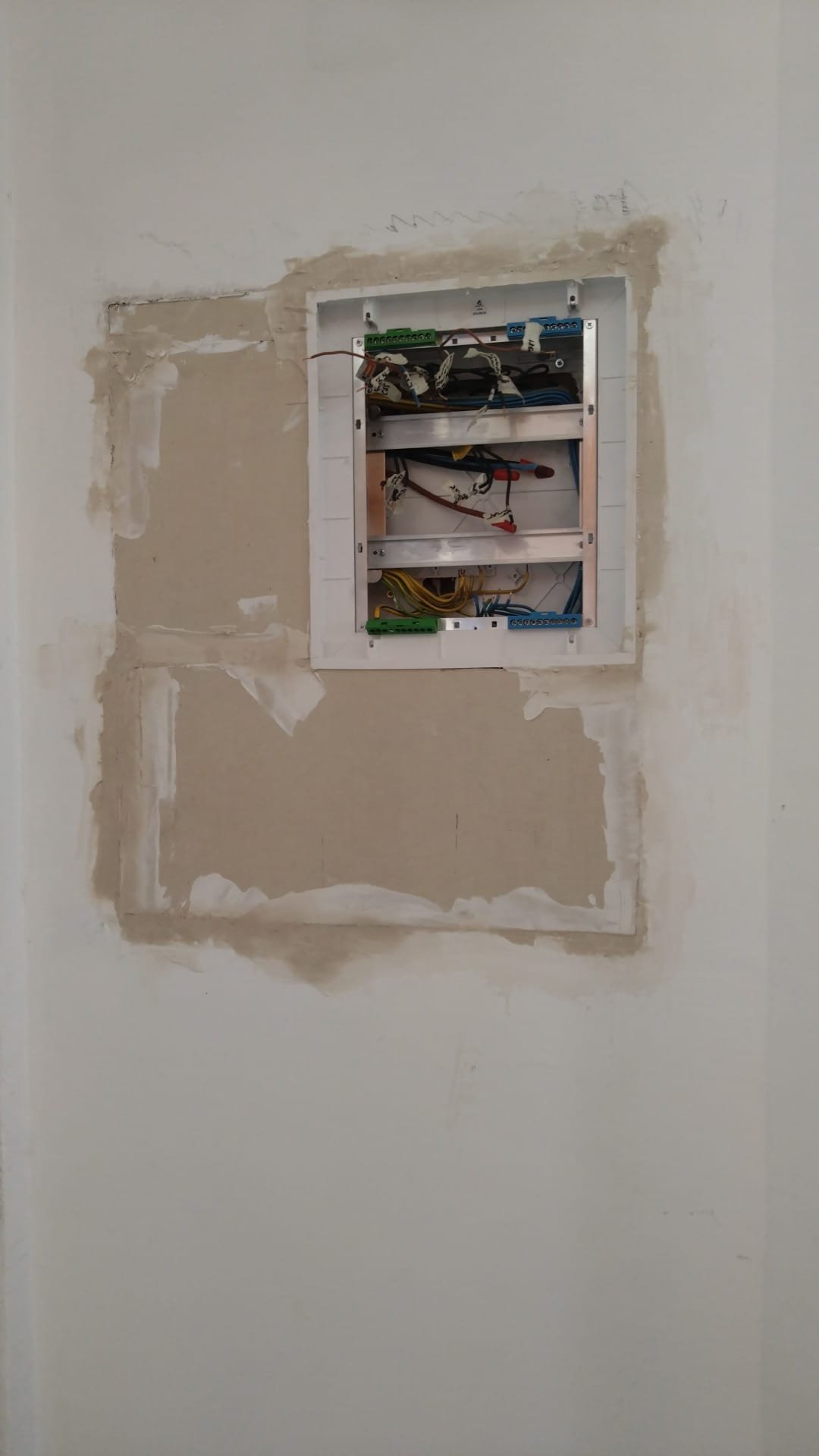 New consumer unit being wired during installation
